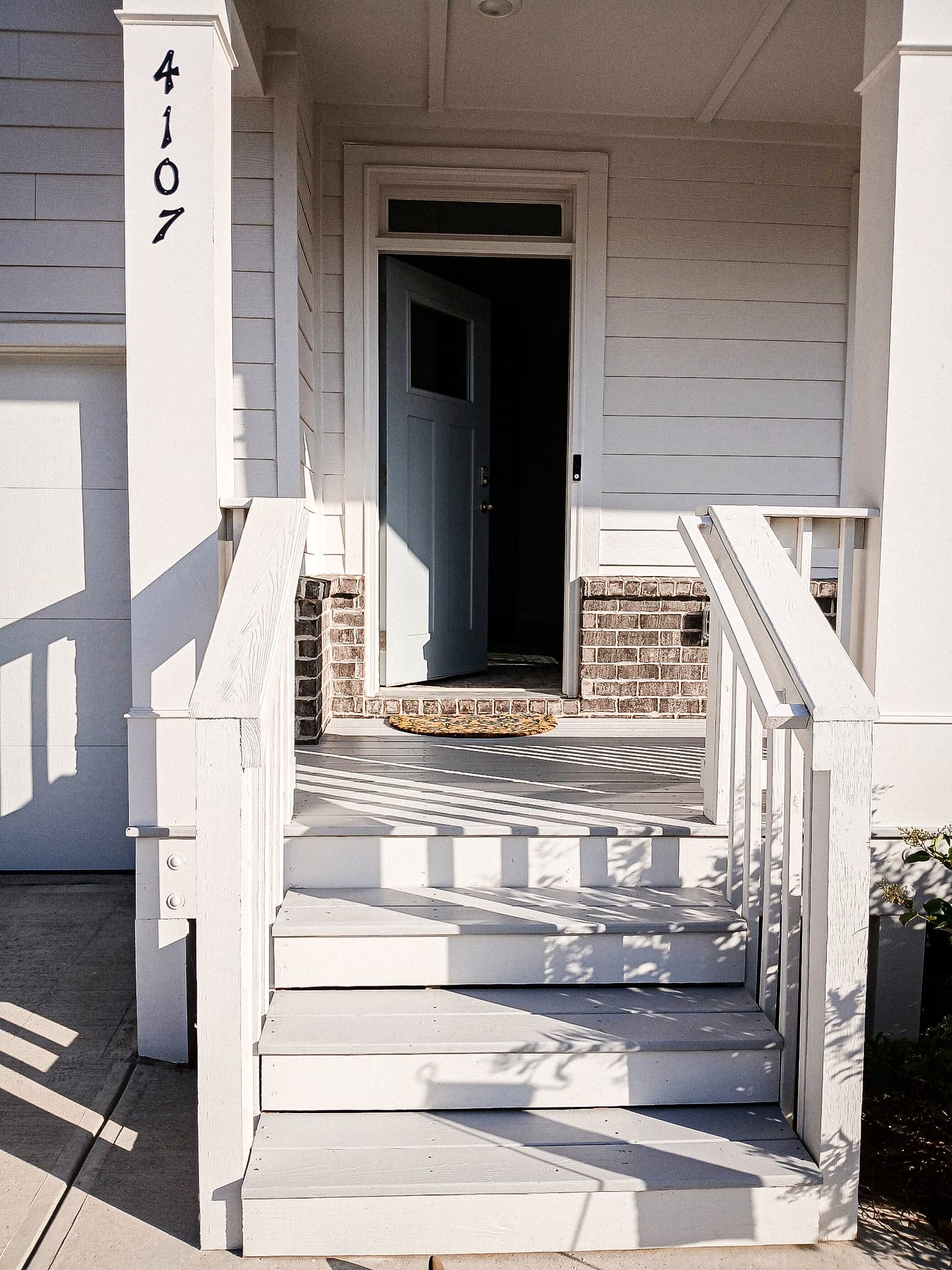 Front porch painting for a Roswell GA area home by ProFound Painting LLC